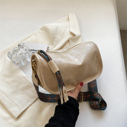 Compartiments pratiques du sac Élégancia™ pour une organisation optimale.